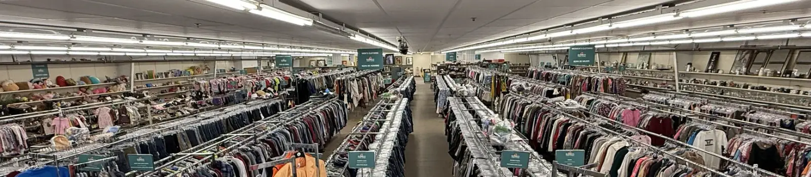 Rows of clothing racks on the sales floor at Bargain Thrift Store in Oklahoma City