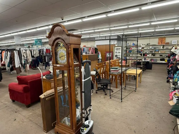 Grandfather clock and used dining furniture at Bargain Thrift Store